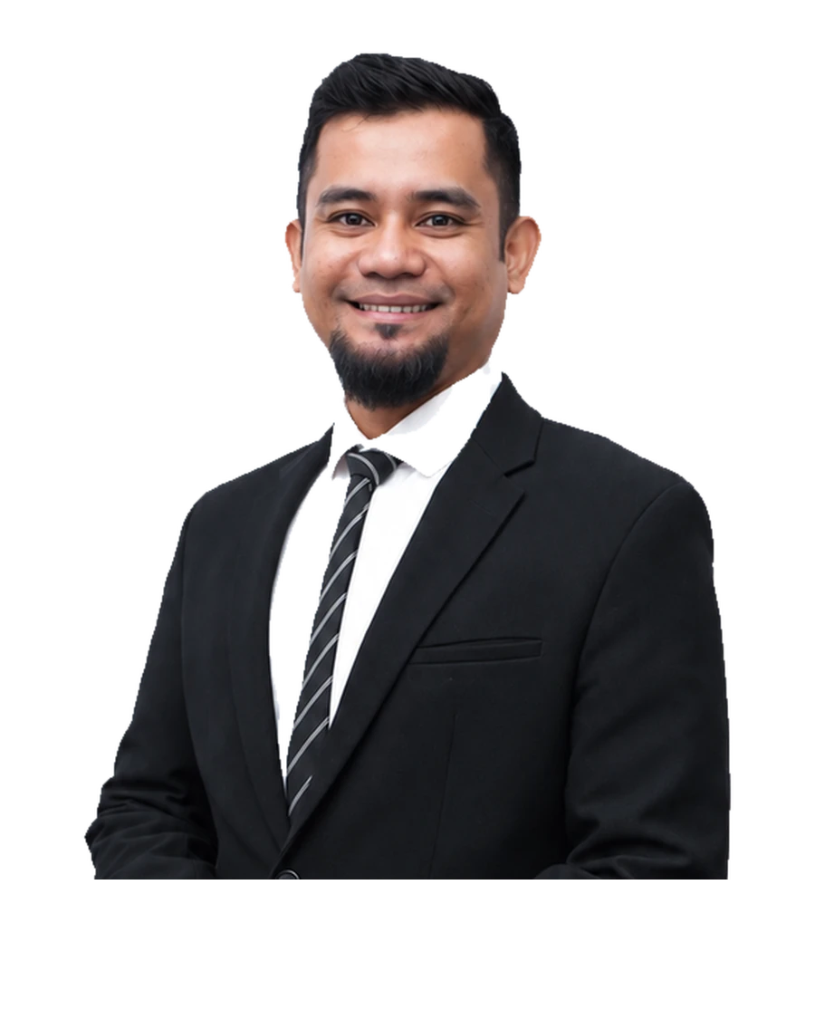Dr Mohd Fadhil, General Surgeon and Endoscopist, in surgical scrubs.
